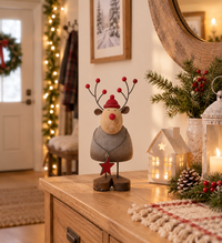 Rustic reindeer ornament, beautifully detailed with a whimsical star accent that captures the essence of countryside charm.